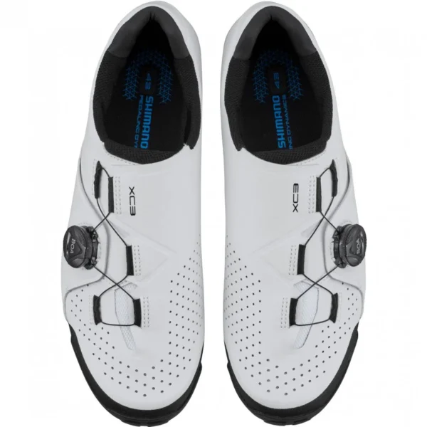 White Shimano XC3 MTB cycling shoes with BOA closure system, top view.