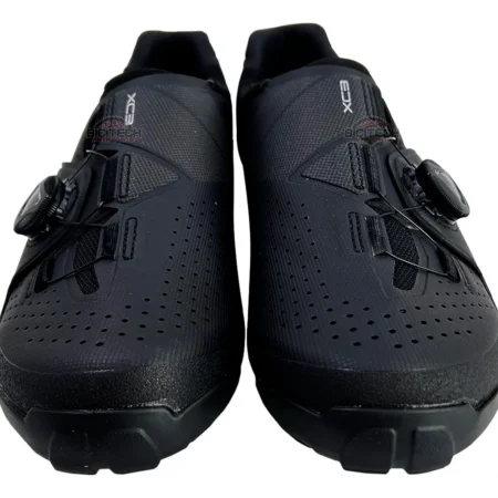 Black Shimano XC-3 MTB cycling shoes. "XC3" text is visible on the shoes.