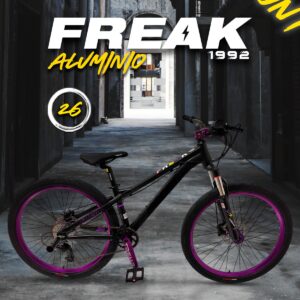 Black PROFIT FREAK stunt bicycle with purple rims and accents, parked in an alleyway. "FREAK ALUMINIO" text visible.